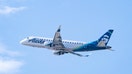 LOS ANGELES, CA - JULY 30: Alaska Airlines Embraer ERJ 170-200 LR takes off from Los Angeles international Airport on July 30, 2022 in Los Angeles, California. 