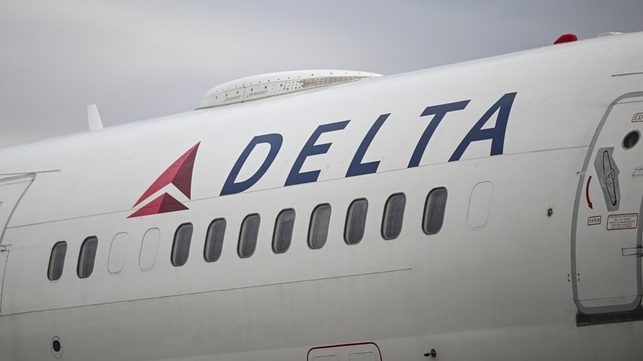 The Delta Air Lines logo on a plane